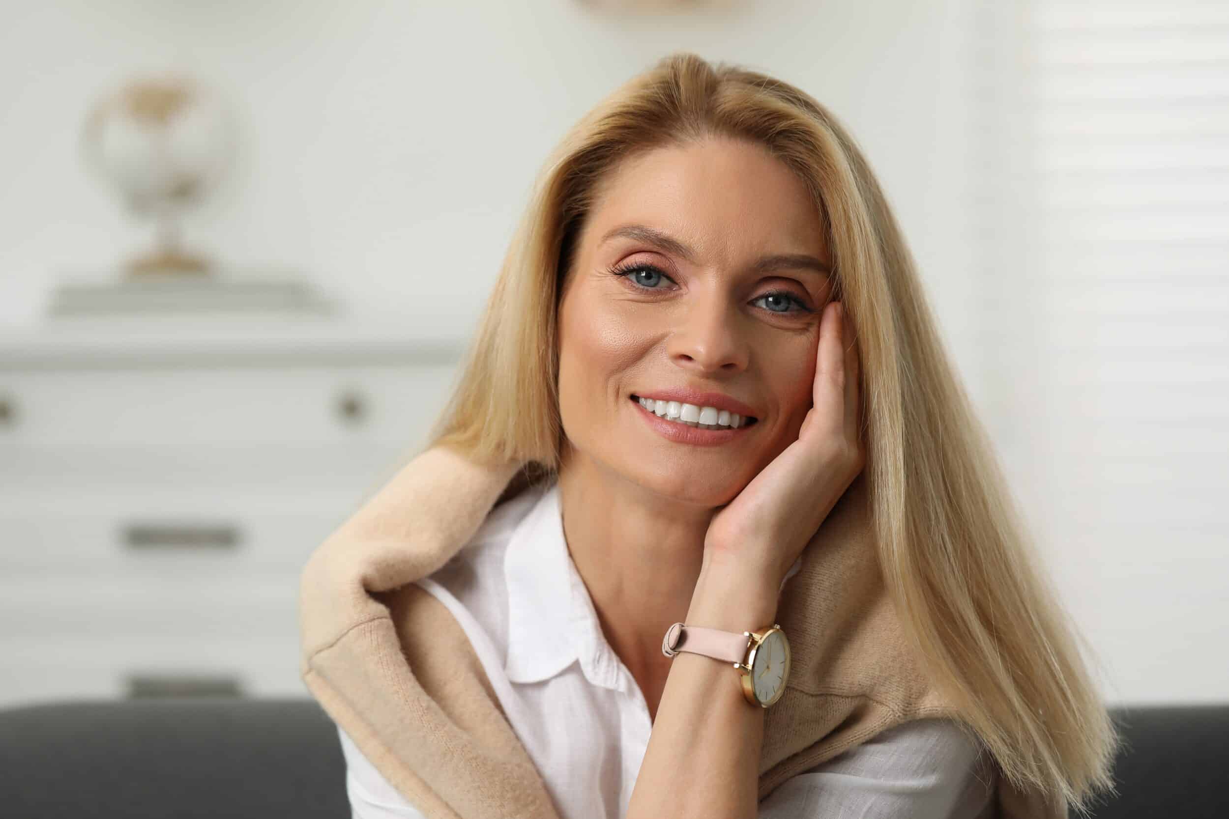 Woman with great smile after dental implants in Herrin, IL