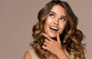 Woman with great smile after veneers in Williamson County, IL